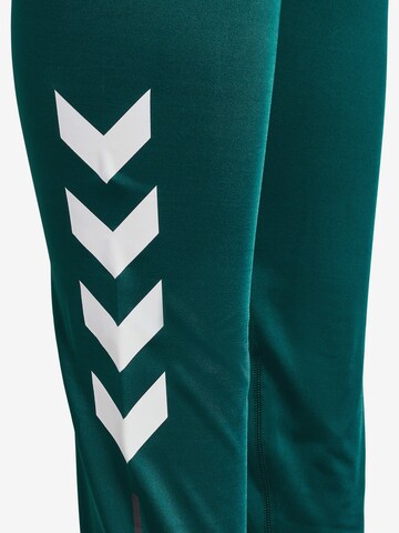 Skinny Pantaloni sport de la Hummel pe verde