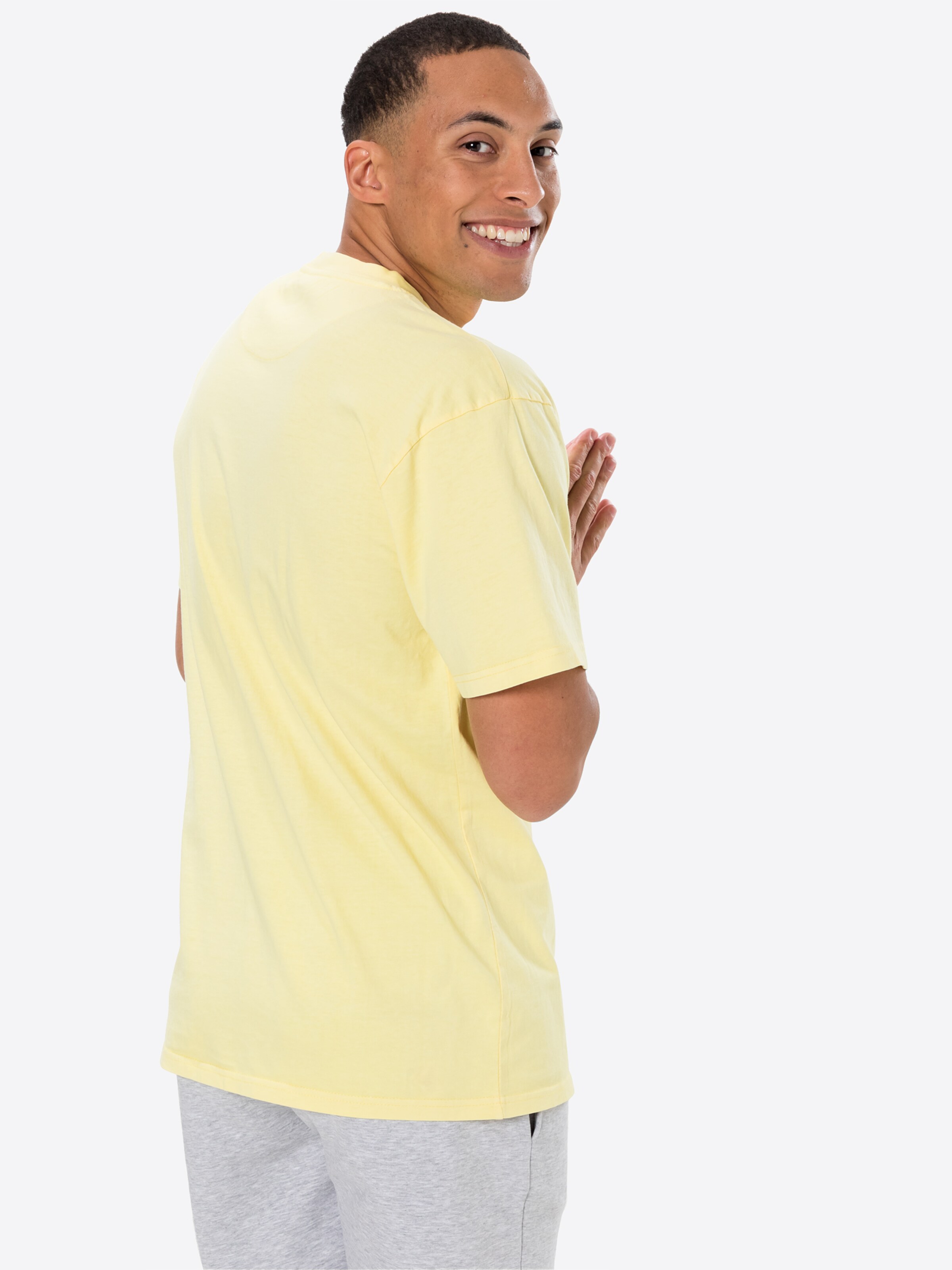 Männer Shirts Karl Kani T-Shirt in Hellgelb - ZL72504 Männer Shirts Karl Kani T-Shirt in Hellgelb - ZL72504