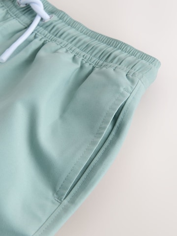 Next Plavecké šortky – zelená