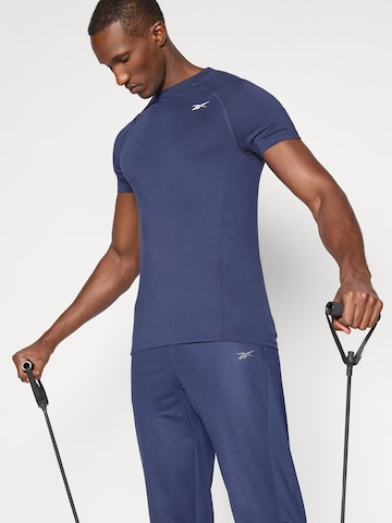 Reebok Funkčné tričko 'ARNIE' - Modrá