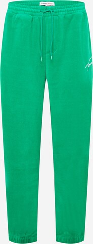 Tommy Jeans Kalhoty – zelená: přední strana