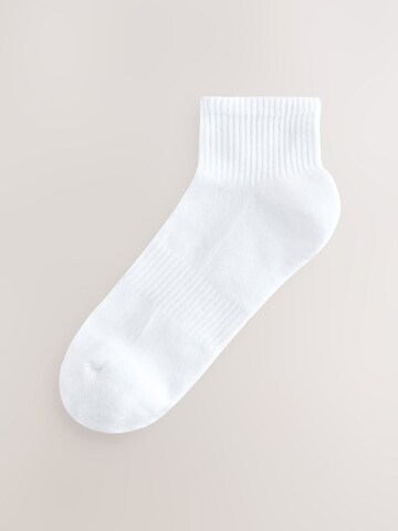 Next Sockor i vit