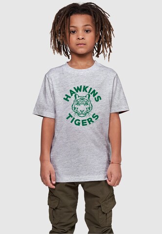 ABSOLUTE CULT T-Shirt ' Stranger Things - Hawkins Tigers' in Grau: Vorderseite