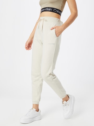 Effilé Pantalon Calvin Klein Sport en beige : devant