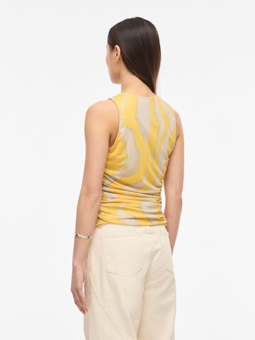 Top di ROUGE EDIT in giallo