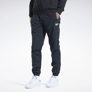 Reebok Tapered Broek 'Vector Track' in Zwart: voorkant