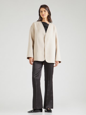 millane Tussenjas in Beige