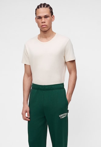 Tapered Pantaloni '1908' de la CONVERSE pe verde