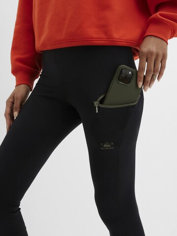bonprix Skinny Sportbroek in Zwart