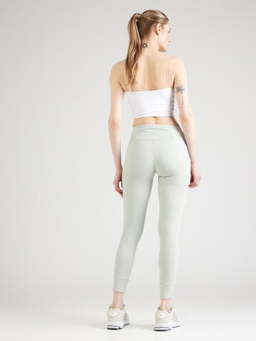 Skinny Pantaloni sportivi di Champion Authentic Athletic Apparel in verde