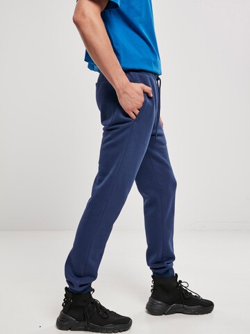 Tapered Pantaloni 'Basic' di Urban Classics in blu