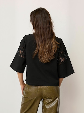 Haut ' Ely ' co'couture en noir
