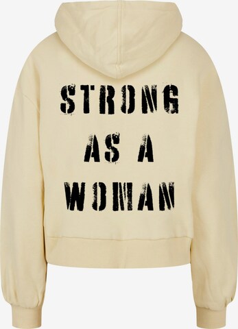 Merchcode Sweatshirt 'Ladies WD - Strong As A Woman' in Gelb