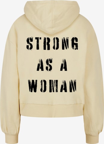 Merchcode Sweatshirt 'Ladies WD - Strong As A Woman' in Geel