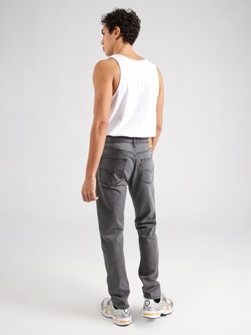 LEVI'S ® Slimfit Jeans '515' in Grau