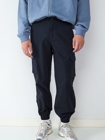 BALMOHK Tapered Gargohousut värissä musta: etupuoli