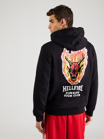 JACK & JONES Sweatshirt 'JORStranger Things' in Black: front