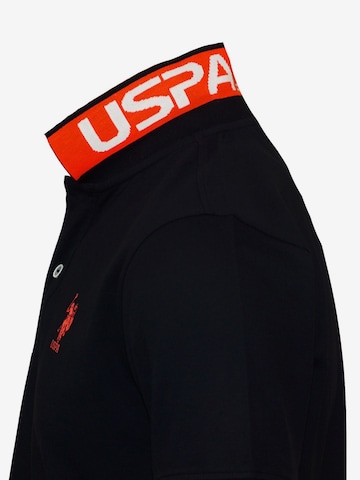 Maglietta 'CAAD' di U.S. POLO ASSN. in nero