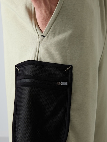 Tommy Life - Perna larga Calças cargo em verde