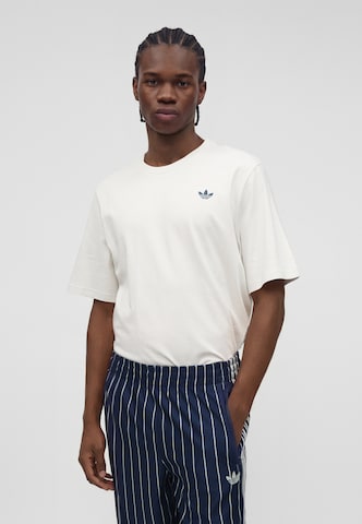 ADIDAS ORIGINALS Normalny krój Spodnie 'FIREBIRD' w kolorze niebieski