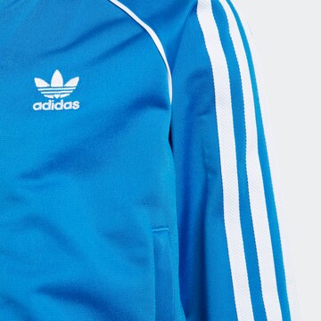 ADIDAS ORIGINALS Träningsoverall 'Adicolor Sst' i blå