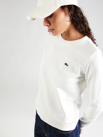 Sweat-shirt LACOSTE en blanc