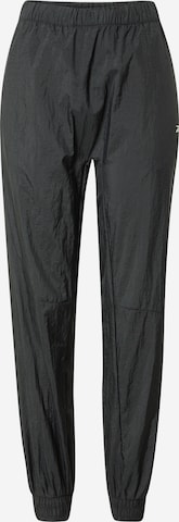 Tapered Pantaloni sportivi di Reebok in nero: frontale