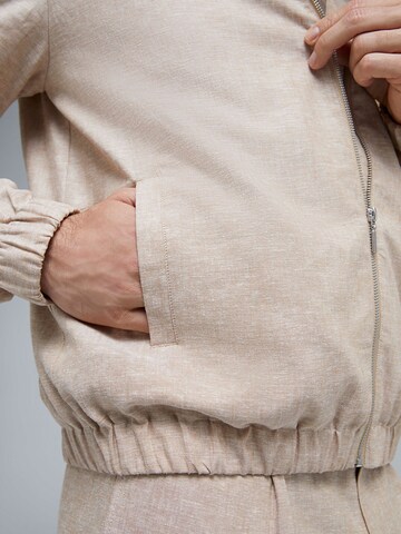 ABOUT YOU x Kevin Trapp Between-Season Jacket 'Franz' in Beige