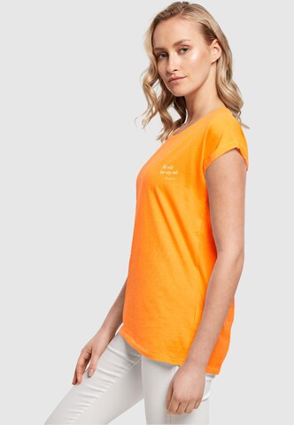 T-shirt 'Happines' Merchcode en orange