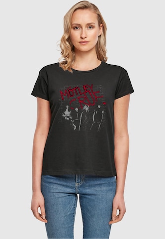 Merchcode Shirt 'Motley Crue - Strong' in Zwart: voorkant