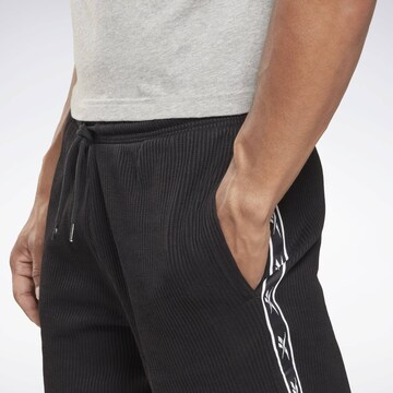 Regular Pantalon de sport 'Vector' Reebok en noir