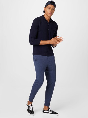 Tapered Pantaloni sportivi di SKECHERS in blu