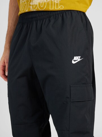 Nike Sportswear Regular Cargobyxa i svart