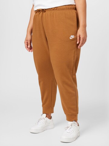 Effilé Pantalon de sport Nike Sportswear en marron : devant