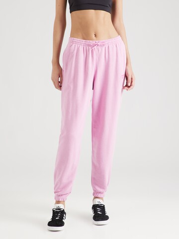 Tapered Pantaloni di Reebok in rosa: frontale