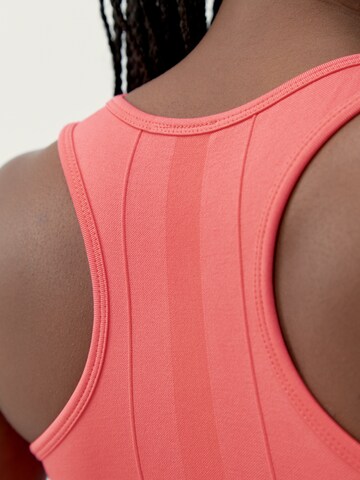 Born Living Yoga Sports Top 'Nish' in Pink