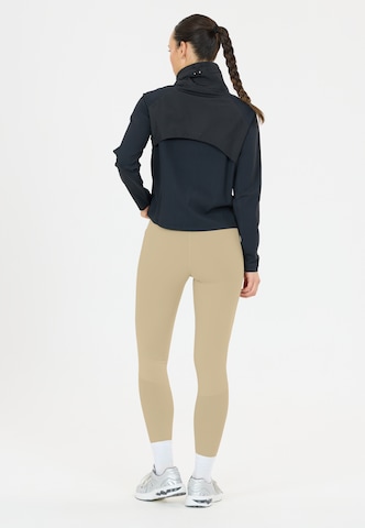 Athlecia Skinny Workout Pants 'Aliya V2' in Brown