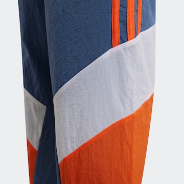 ADIDAS SPORTSWEAR Tapered Sports trousers 'Colorblock ' in Blue
