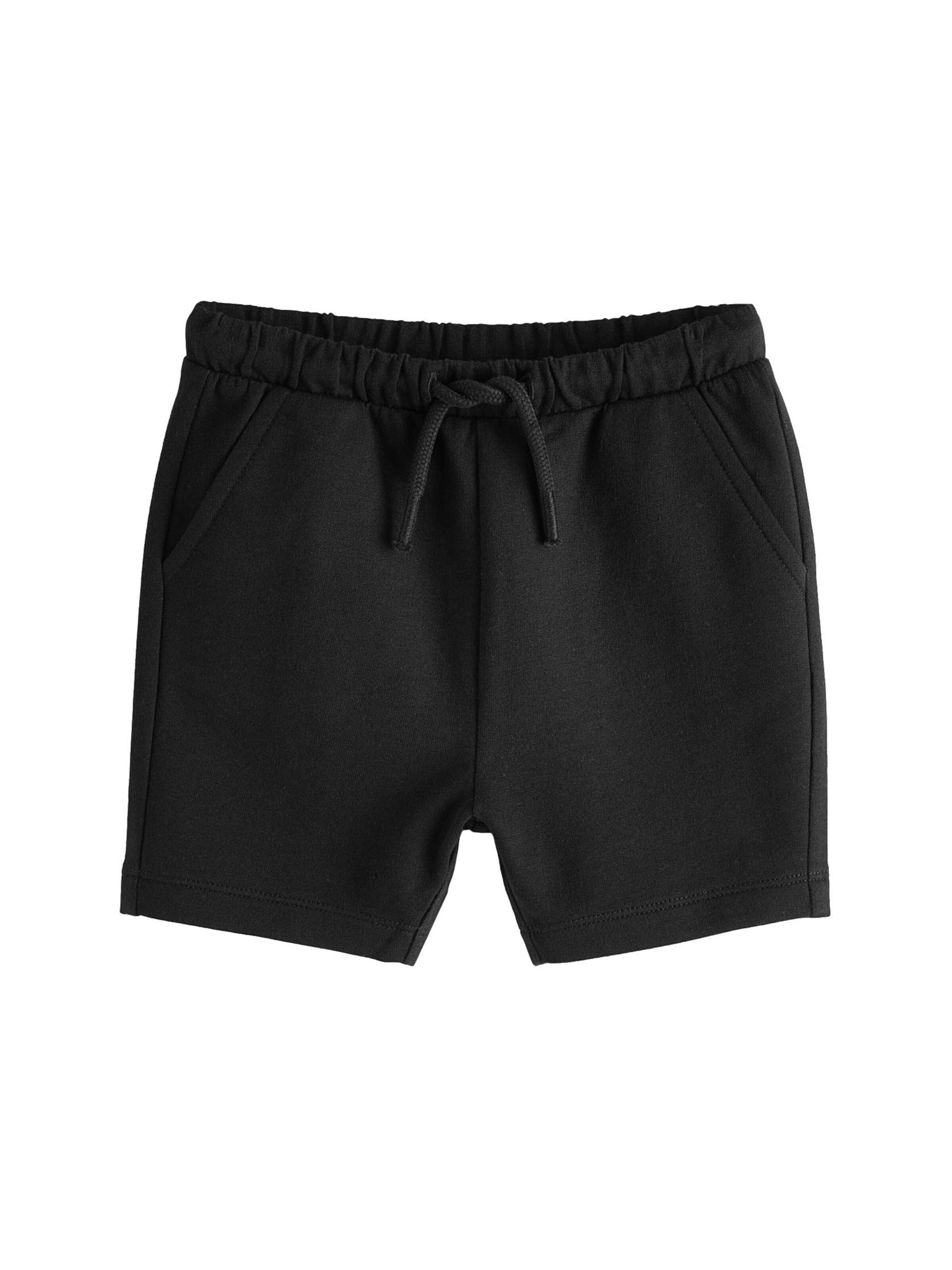 Next Nohavice - Čierna: predná strana