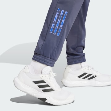 ADIDAS PERFORMANCE Zwężany krój Spodnie sportowe 'Essentials' w kolorze niebieski