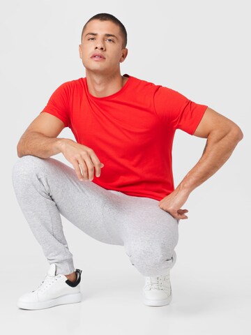 Champion Authentic Athletic Apparel Tapered Sportbroek in Grijs