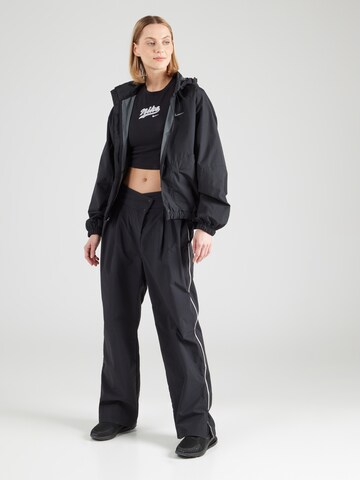 NIKE Sportdzseki 'SWIFT' - fekete
