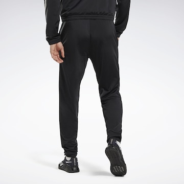 Tapered Pantaloni sportivi di Reebok in nero