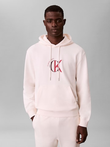 Sweat-shirt Calvin Klein Jeans en blanc : devant