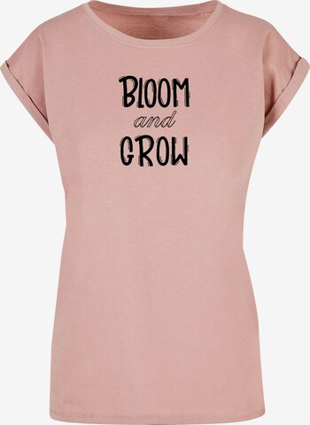 Merchcode T-Shirt 'Spring - Bloom And Grow' in Pink: predná strana