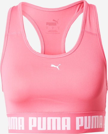 Reggiseno sportivo di PUMA in rosa: frontale