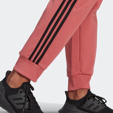 ADIDAS SPORTSWEAR Tapered Workout Pants 'Future Icons 3-Stripes' in Pink