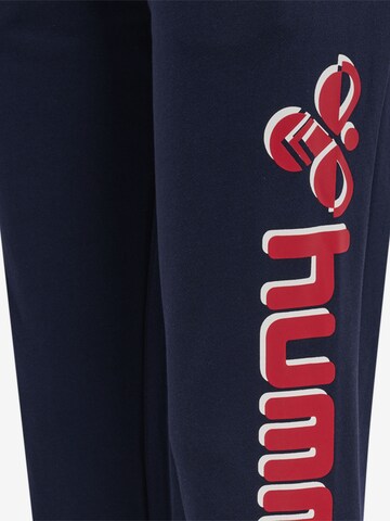 Effilé Pantalon de sport Hummel en bleu