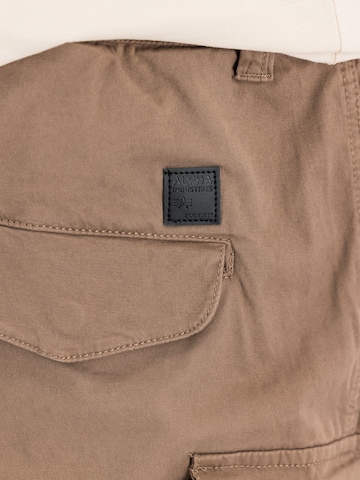 Effilé Pantalon cargo 'Airman' ALPHA INDUSTRIES en vert