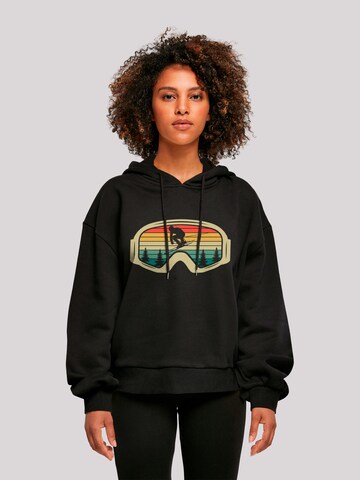 Sweat-shirt 'Retro Skibrille Wintersport' F4NT4STIC en noir : devant